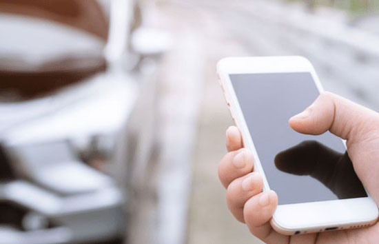vehicle on side of road driver on phone